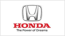 A honda logo is shown on the side of a car.