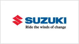 A suzuki logo is shown on the side of a car.